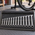 Front close-up of the chrome spanners in the tool roll pockets