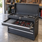 3-drawer steel tool chest kit with the top drawer open in a garage workshop